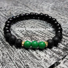 Load image into Gallery viewer, Bracelets Design with black, green  glass and lava beads... size 8.5&quot;