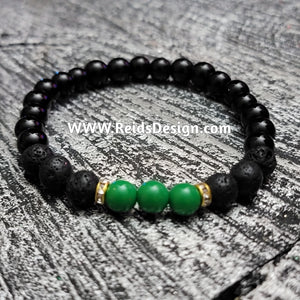Bracelets Design with black, green  glass and lava beads... size 8.5"