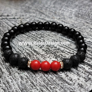 Bracelets Designed with black, red glass and lava beads... size 8.5"
