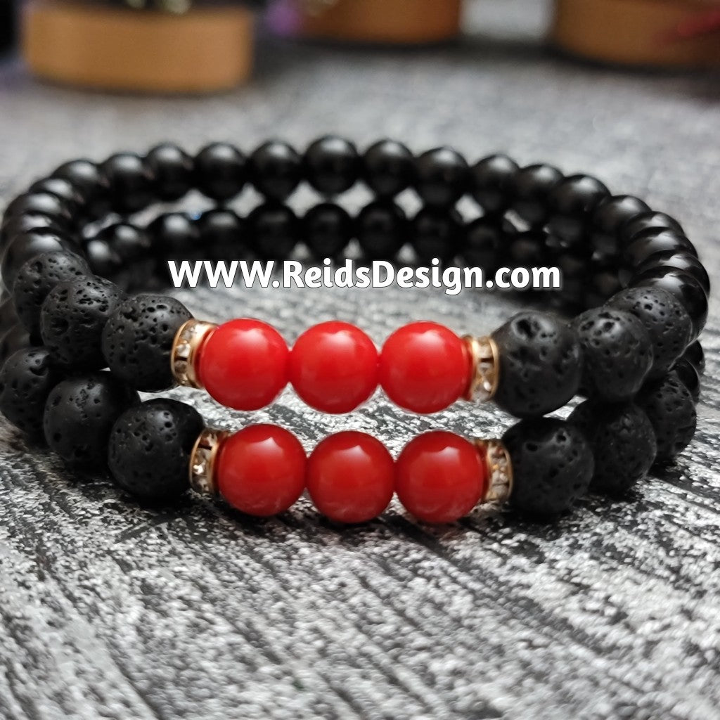 Bracelets Designed with black, red glass and lava beads... size 8.5