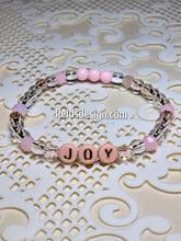 Load image into Gallery viewer, &quot;JOY&quot; 6mm mixed pink, clear and white Beaded Bracelet.     ( size 7.5&quot; )