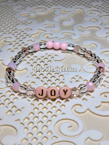 "JOY" 6mm mixed pink, clear and white Beaded Bracelet.     ( size 7.5" )