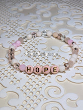 Load image into Gallery viewer, &quot;HOPE&quot; 6mm mixed pink, clear and white Beaded Bracelet.     ( size 7.5&quot; )