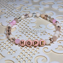 Load image into Gallery viewer, &quot;HOPE&quot; 6mm mixed pink, clear and white Beaded Bracelet.     ( size 7.5&quot; )