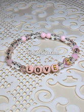 Load image into Gallery viewer, &quot;LOVE&quot; 6mm mixed pink, clear and white Beaded Bracelet.     ( size 7.5&quot; )