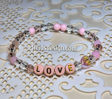 Load image into Gallery viewer, &quot;LOVE&quot; 6mm mixed pink, clear and white Beaded Bracelet.     ( size 7.5&quot; )