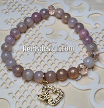 Load image into Gallery viewer, Milky Topaz Pink Czech Glass Rinestone Heart with Butterfly 8 mm Beaded Bracelet.  Size 7.5