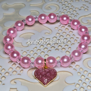 Pink 8mm Glass Pearls Bracelet with Pink Heart... size 7.5"