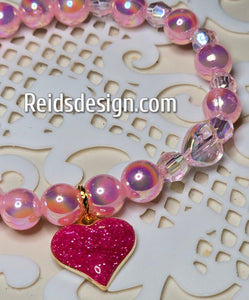 Glass Pearls and Acrylic Breaded  Bracelet with a Pink Heart ..... size 7.5"