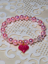 Load image into Gallery viewer, Glass Pearls and Acrylic Breaded  Bracelet with a Pink Heart ..... size 7.5&quot;