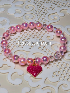 Glass Pearls and Acrylic Breaded  Bracelet with a Pink Heart ..... size 7.5"