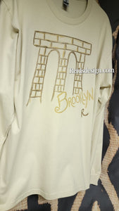 New...Brooklyn Bridge Hand Painted Off White Bronze and Gold  Long Sleeve by Reids' Design ( size Men Large / Women XL )