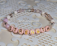 Load image into Gallery viewer, &quot;STRENGTH&quot; 6mm mixed pink, clear and white Beaded Bracelet.     ( size 7.5&quot; )