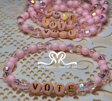 Load image into Gallery viewer, &quot;VOTE&quot; 6mm mixed pink, clear and white Beaded Bracelet.     ( size 7.5&quot; )