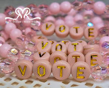 Load image into Gallery viewer, &quot;VOTE&quot; 6mm mixed pink, clear and white Beaded Bracelet.     ( size 7.5&quot; )