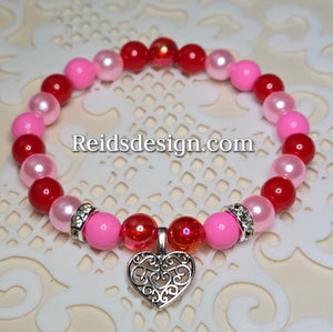 "❤️" Heart charm Acrylic Beaded Bracelet (size 7.5")