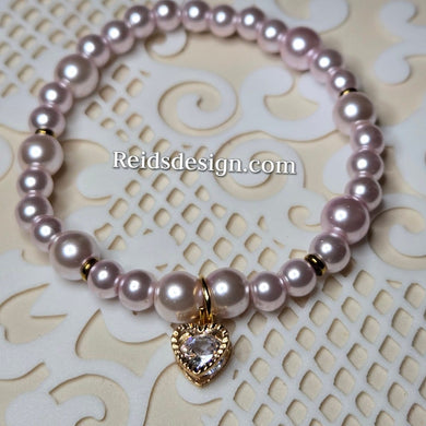 ♥️ New... Lavender 6mm and 8mm Glass Beaded Bracelet with a Heart(size 7.5