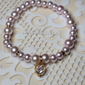 ♥️ New... Lavender 6mm and 8mm Glass Beaded Bracelet with a Heart(size 7.5")