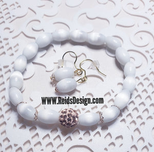 Sale...White cats eye bracelet and earring set ( size 7" )