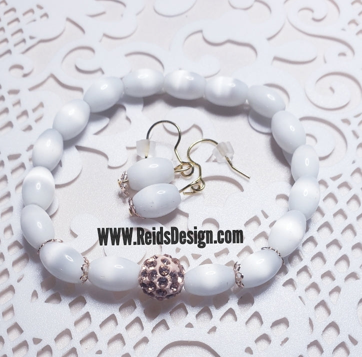 Sale...White cats eye bracelet and earring set ( size 7