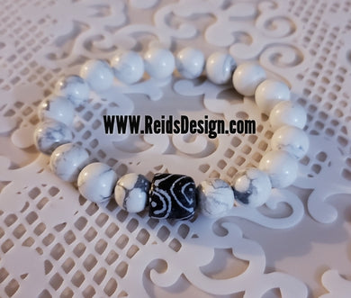 Howlite and African glass bead Bracelet ( size 7.5 