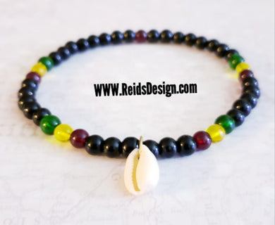 Sale...Black, Red, Green and Yellow Anklet with cowrie shell