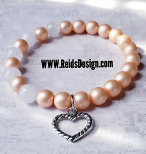 Glass Pearl and Snow Quartz 🧡 Bracelet ( size 7.5" )