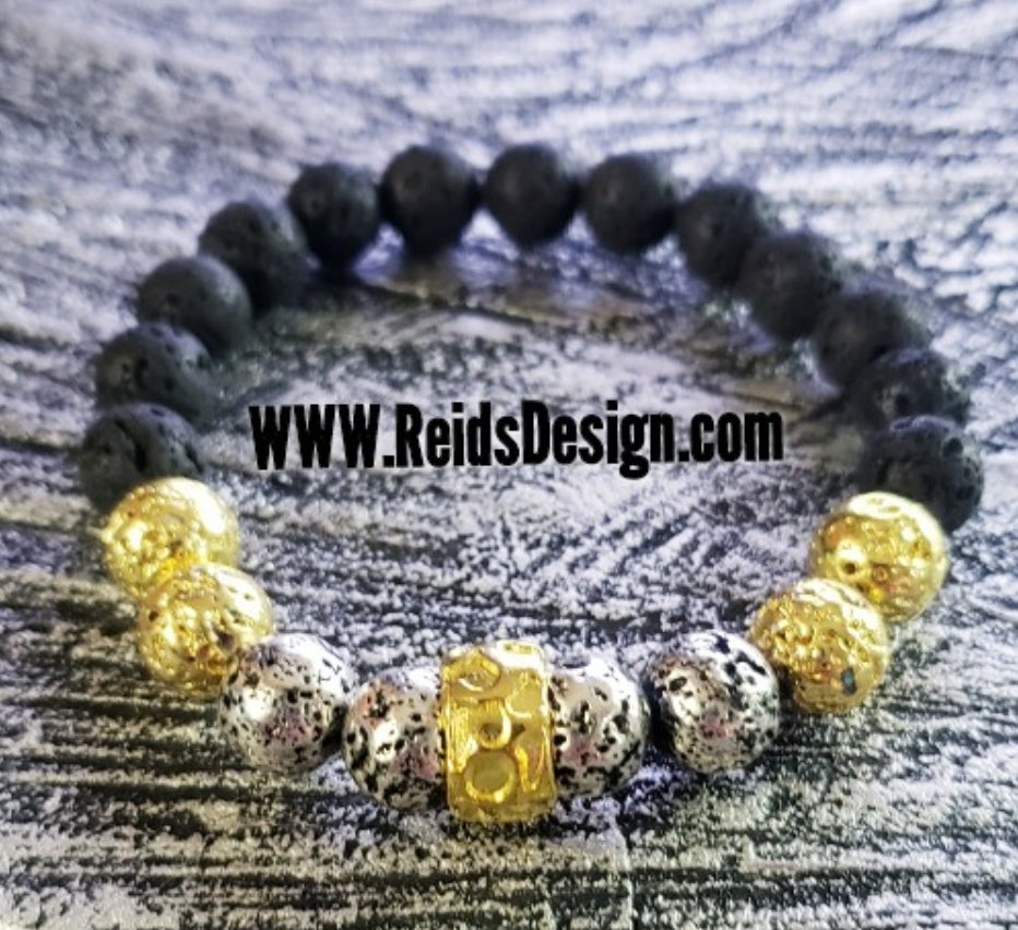 Gold, Silver and Black Lava Beaded Bracelet  size (8.5